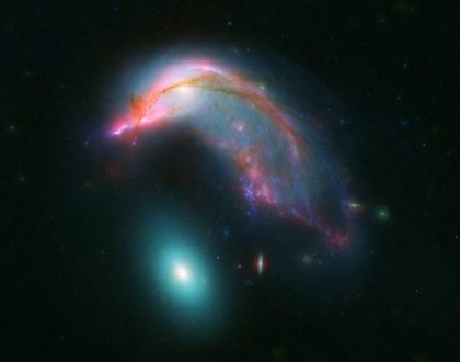 Cute galaxies look like a penguin guarding its egg     - CNET